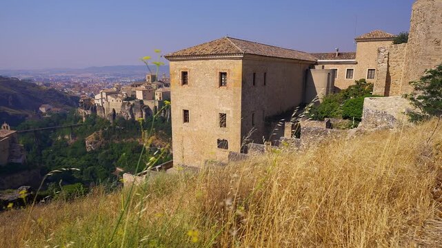 Historic stone buildings overlooking the old town and Huecar gorge in Cuenca Castilla La Mancha
