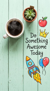 Steaming coffee cup and succulent plant on light green wooden surface with inspirational drawings, symbolizing motivation and dreams