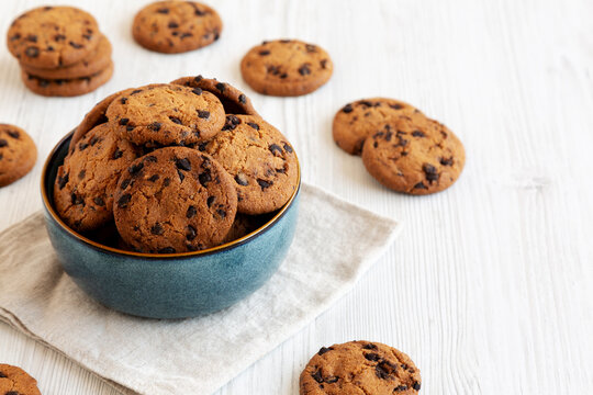 Homemade Chocolate Chip Cookies in a Bowl, side view. Copy space.