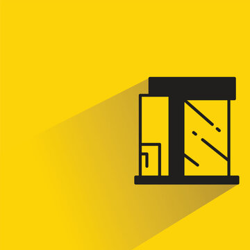 modern house building with shadow on yellow background