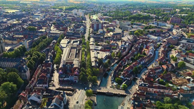 Amiens is a historic northern French city bisected by the Somme River, famous for its floating gardens, brick architecture, vibrant quarters, and rich medieval, industrial, and literary heritage.