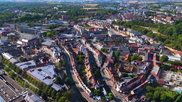 Amiens is a historic northern French city bisected by the Somme River, famous for its floating gardens, brick architecture, vibrant quarters, and rich medieval, industrial, and literary heritage.