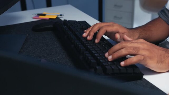 Close-up of Male Software developer, Businessman hand typing on keyboard. Programmer typing write code for Software development and Cyber security concept.