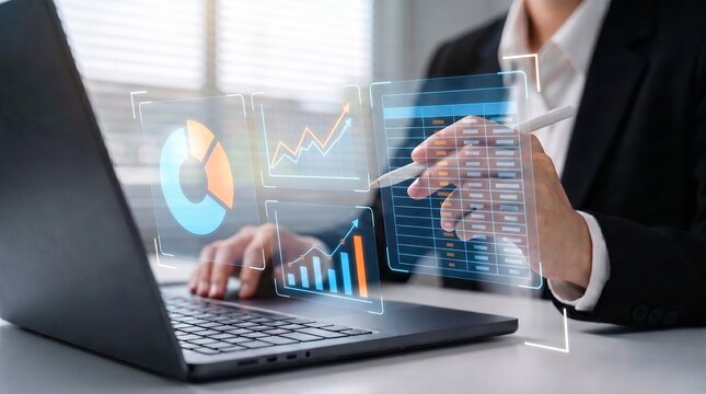 business professional using a digital analytics dashboard on laptop to monitor performance metrics, review data tables, and support strategic decision making.

