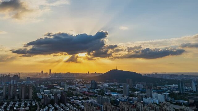 Hefei Dashu Mountain Aerial Timelapse: Sunset Melts Gold Over City and Hills, TV Tower Stands Amid Green Canopy