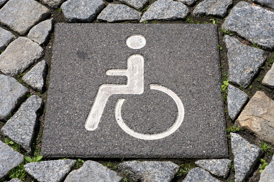 Wheelchair Accessible Parking Symbol on Pavement for Inclusive Mobility