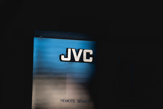 Urdorf, Switzerland - July 10, 2026. Close up of the vintage jvc brand logo on a black electronic audio receiver