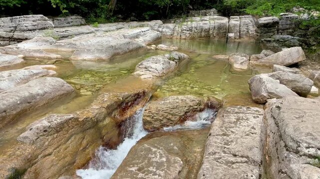 Picturesque river with cascades in Okatse canyon in Georgia