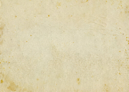 Vintage paper texture. Old stained paper background with copy space. Aged and yellowed paper.