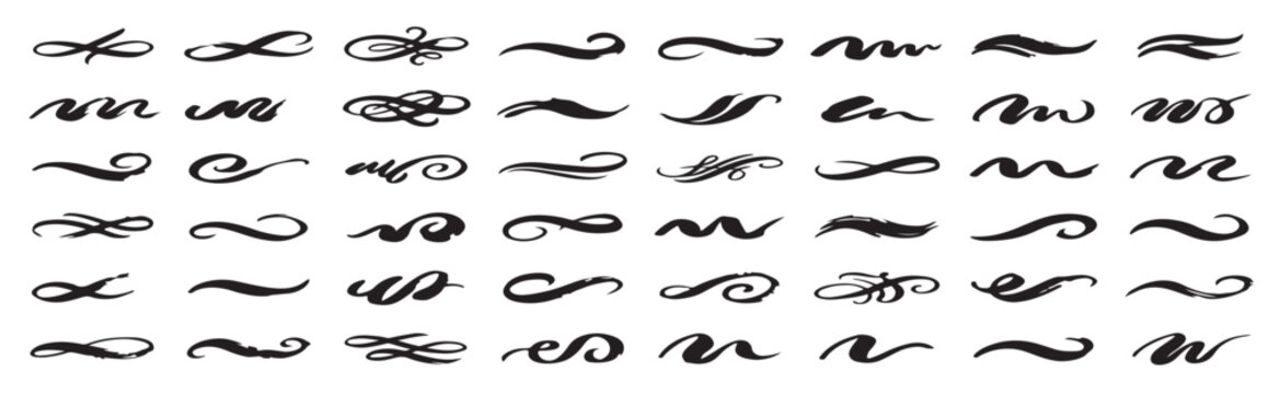 Collection of various black ink hand drawn flourish dividers and decorative swirly calligraphic line elements isolated