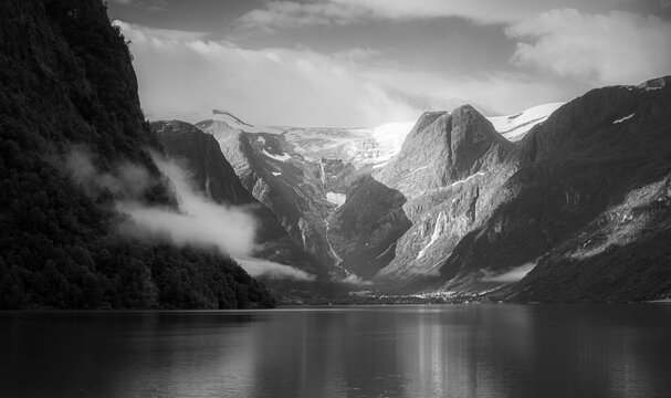 Briksdalsbreen Glacier and Oldevatnet Lake, Norway &ndash; Dramatic Black and White Fjord Landscape
