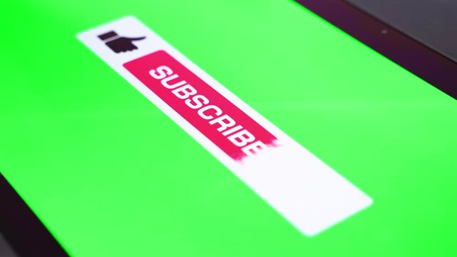 Subscribe sign with hand and bell symbol appears on a device screen, green background. Subscribe or sign up for social media, video channel, online store, website, blog, influencer account, newsletter