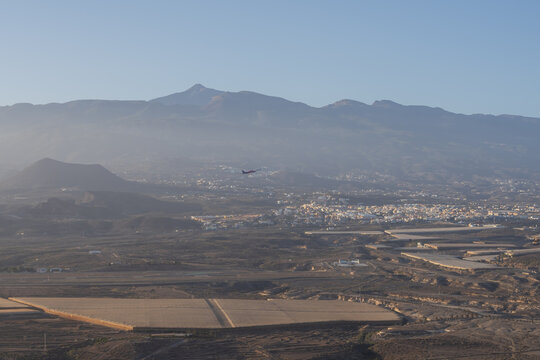 Beautiful panoramic landscape viewed from Red Mountain featuring Mount Teide, volcanic hills and the natural scenery of Tenerife, Spain.