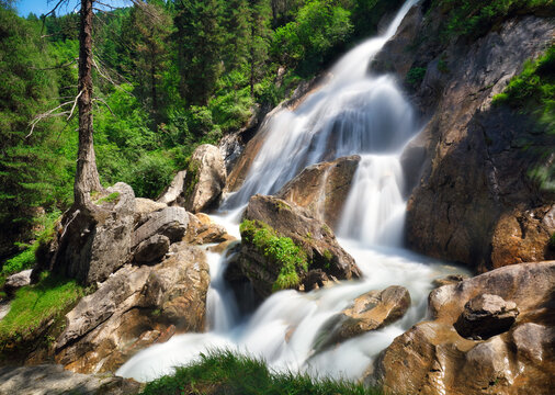 Waterfall near HinterTux on a mountain brook. Zillertal alps Zillertaler, Austria