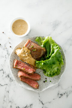 Beef steak with peppercorn sauce