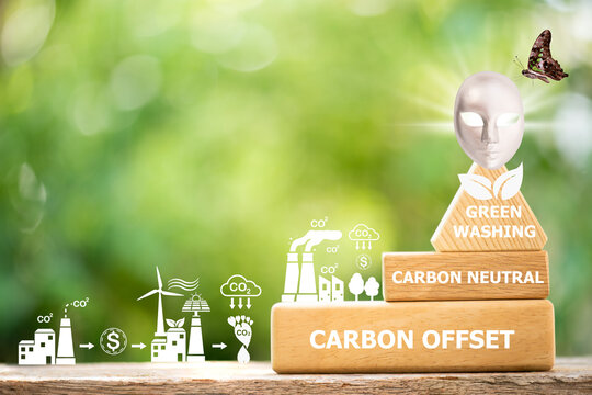 Carbon offset ,carbon neutral,green washing word on wood and icon concept for environmental in sustainable on nature background.