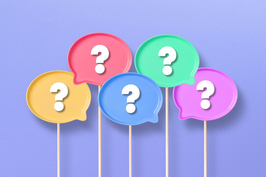 Question Mark design with colorful speech bubbles on purple background