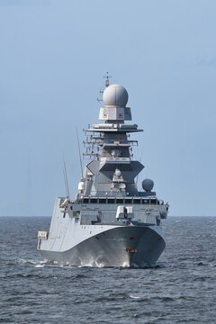 Italian naval frigate underway at sea, front view