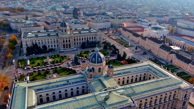 Aerial drone view of the Kunsthistorisches Museum and Natural History Museum facing Maria Theresien Platz with gardens and the MuseumsQuartier, Vienna, Austria, in autumn.