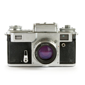 Scene featuring old rangefinder camera isolated on white background