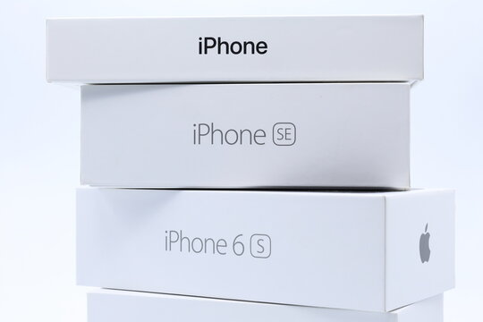 Iphone box. Cell phone. From the company Apple. White background. Close up product photo.