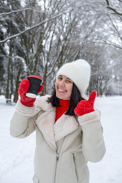 Woman Enjoying Coffee in Snowy Winter Park Copy Space