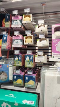 Royan, France - July 25, 2026: E.Leclerc ROYAN CEDEX. Colorful baby products displayed on shelves in a retail store, featuring various packaging designs and price tags visible