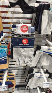 Royan, France - July 25, 2026: E.Leclerc ROYAN CEDEX. Sergio Tacchini boys' underwear displayed on a retail shelf with a 50% discount tag visible in a clothing store