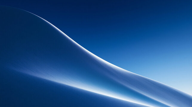 Pristine Snow Dune Under Clear Blue Sky in Winter