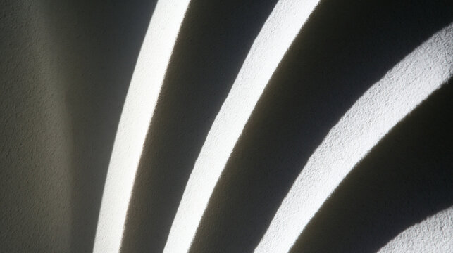 Abstract Light and Shadow Pattern on Textured Wall Surface
