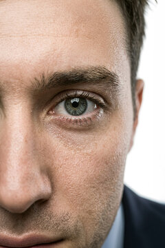 Close-up portrait of a man with blue eyes