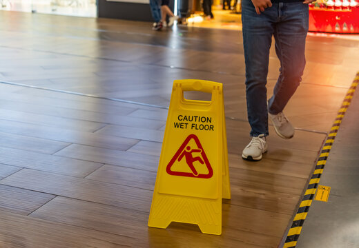 Caution wet floor sign on wet floor