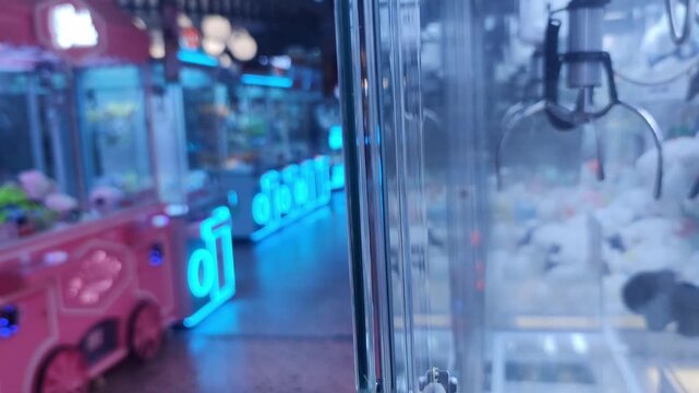 Blurred Defocused Arcade Game Center with Colorful Neon Lights and Claw Machines Background, Bokeh Entertainment Backdrop