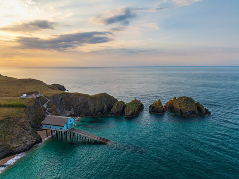 Stunning peaceful Summer sunset landscape over Trevose Head in Cornwall England