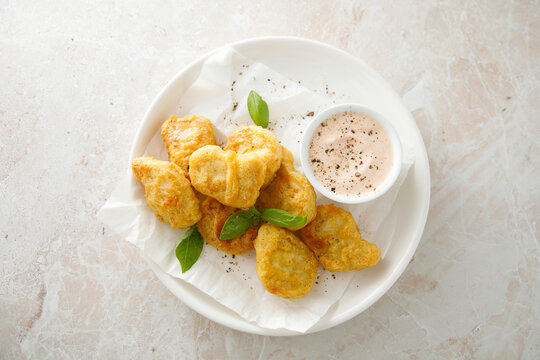 Homemade chicken nuggets with sauce