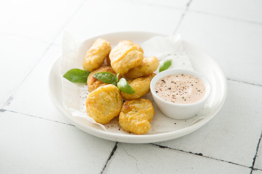 Homemade chicken nuggets with sauce