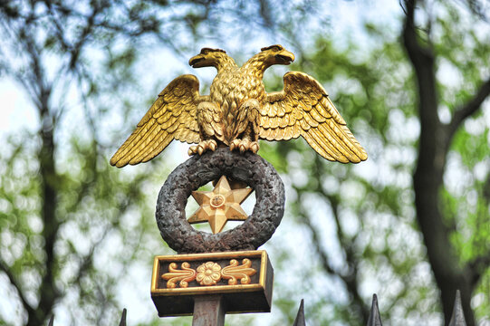 Gilded Double-Headed Eagle on Historic Anichkov Palace Garden Fence in Saint Petersburg