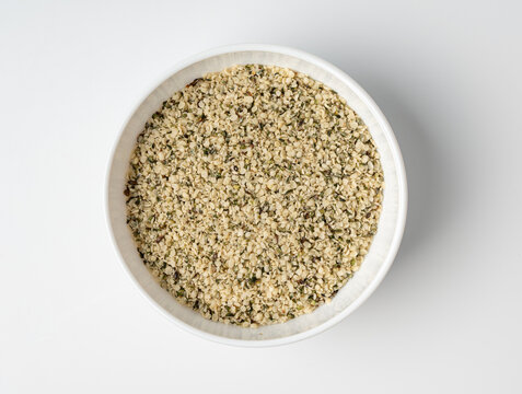 Shelled hemp seeds pile isolated, peeled cannabis grains, marijuana kernels without peel