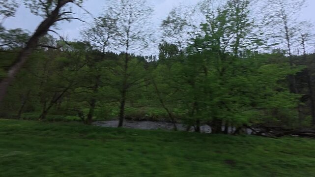 RB60 Schwarzatalbahn Rottenbach Katzhutte train window wiew Schwarza river in Thuringer wald 