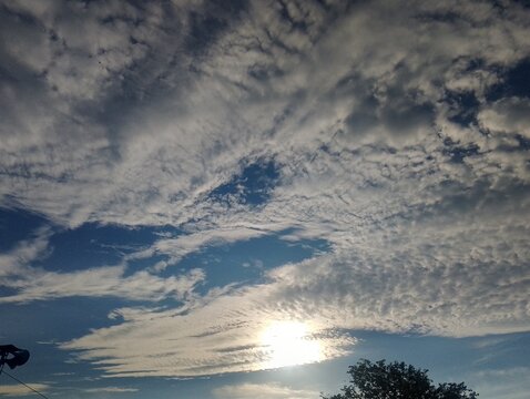 Dramatic cloudscape with sunlight breaking through the clouds