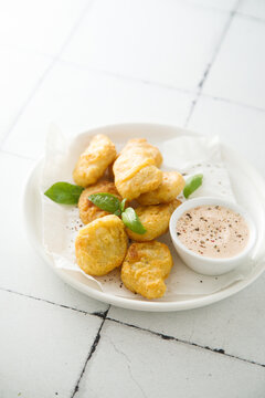 Homemade chicken nuggets with sauce
