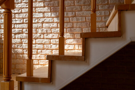 Modern Wooden Staircase with White Brick Wall Interior