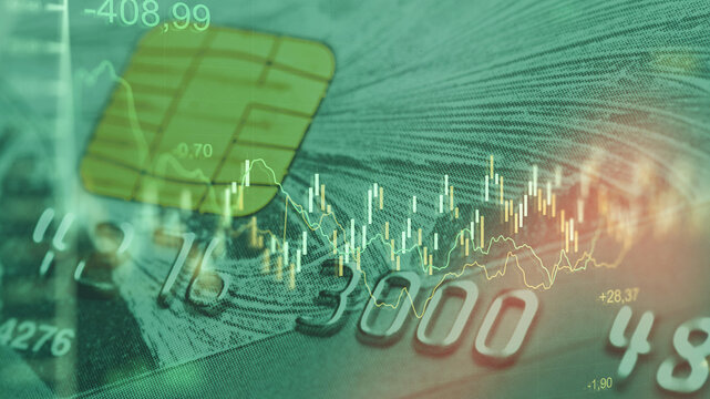 Business chart showing stock exchange trading alongside a credit card graphic in a digital workspace setting