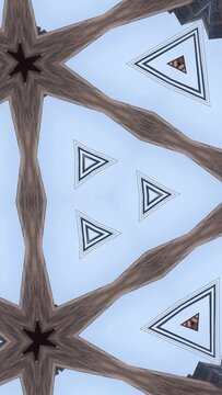 Abstract geometric kaleidoscope pattern with triangle shapes and wooden textures on a light blue background.