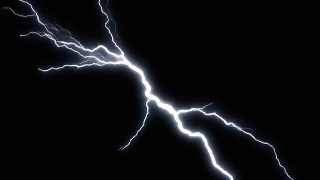 A bright white lightning bolt strikes across a dark black night sky.