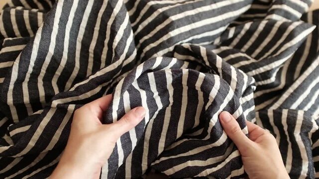 Dark navy blue and white striped linen fabric. Ideal for summer fashion promos, textile industry presentations, coastal interior decor themes, sewing and tailoring business, textile stores.