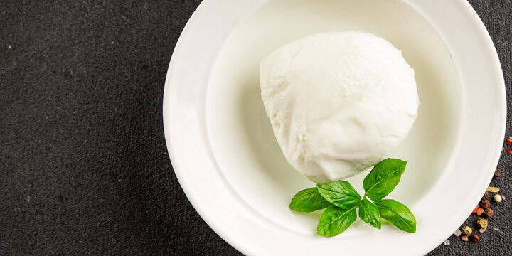 Mozzarella curd cheese mozzarella di bufala appetizer food preparation dish tasty snack fresh and delicious gourmet rustic food background on the table&nbsp; rustic food top view copy space