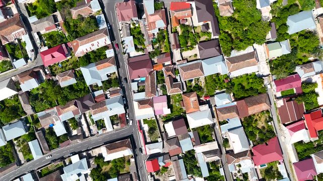 Panoramic aerial view of Sheki city surrounded by Caucasus mountains, Azerbaijan - 4K drone footage