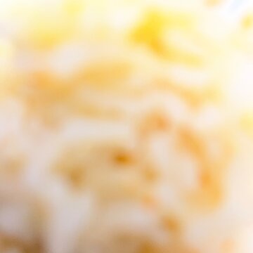 Blurred abstract yellow and orange bokeh background texture