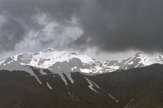 Dramatic storm clouds over Ligurian Alps mountain range, Italy